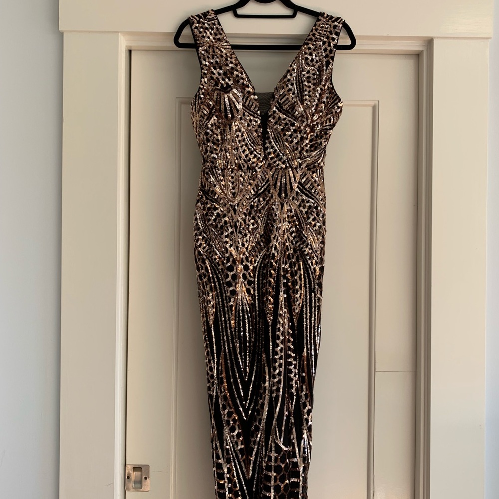Black and gold Gianni Bini sequin evening gown.